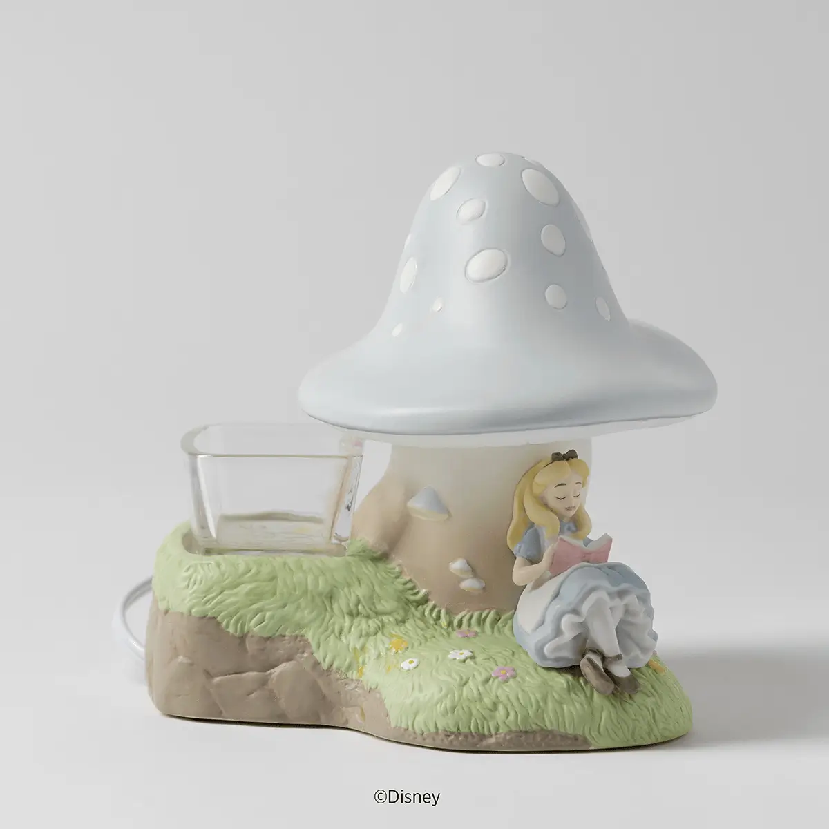 Homewarmeraliceinwonderlandpackshotdetailra2026Pws_Highres Alice in Wonderland Down the Rabbit Hole Scentsy Warmer | 75th Anniversary