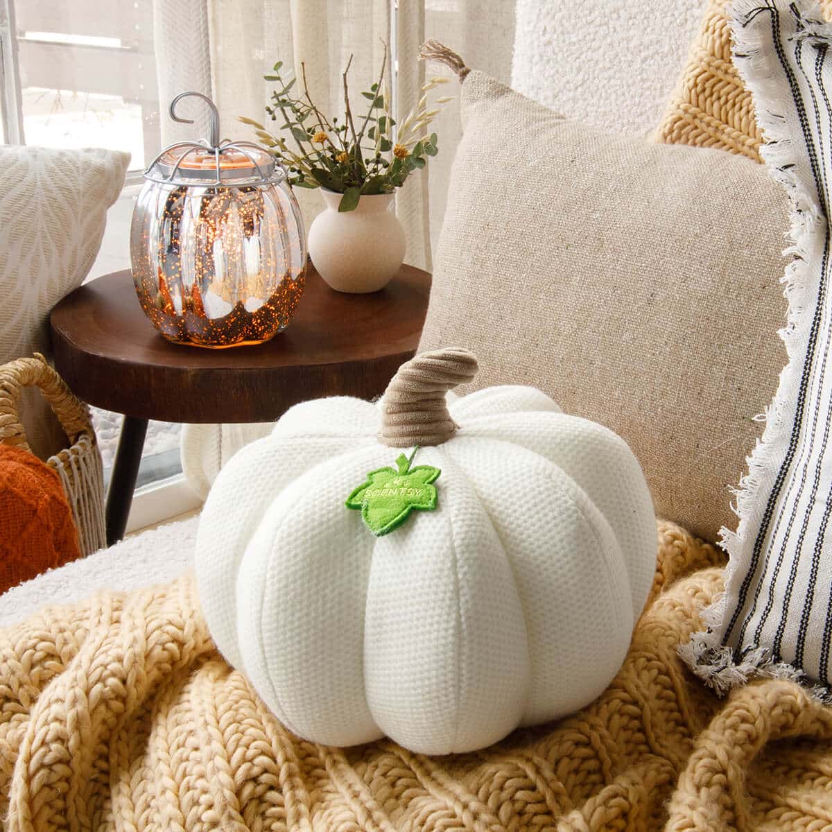 10. Sweet And Spooky Pumpkin Pillow