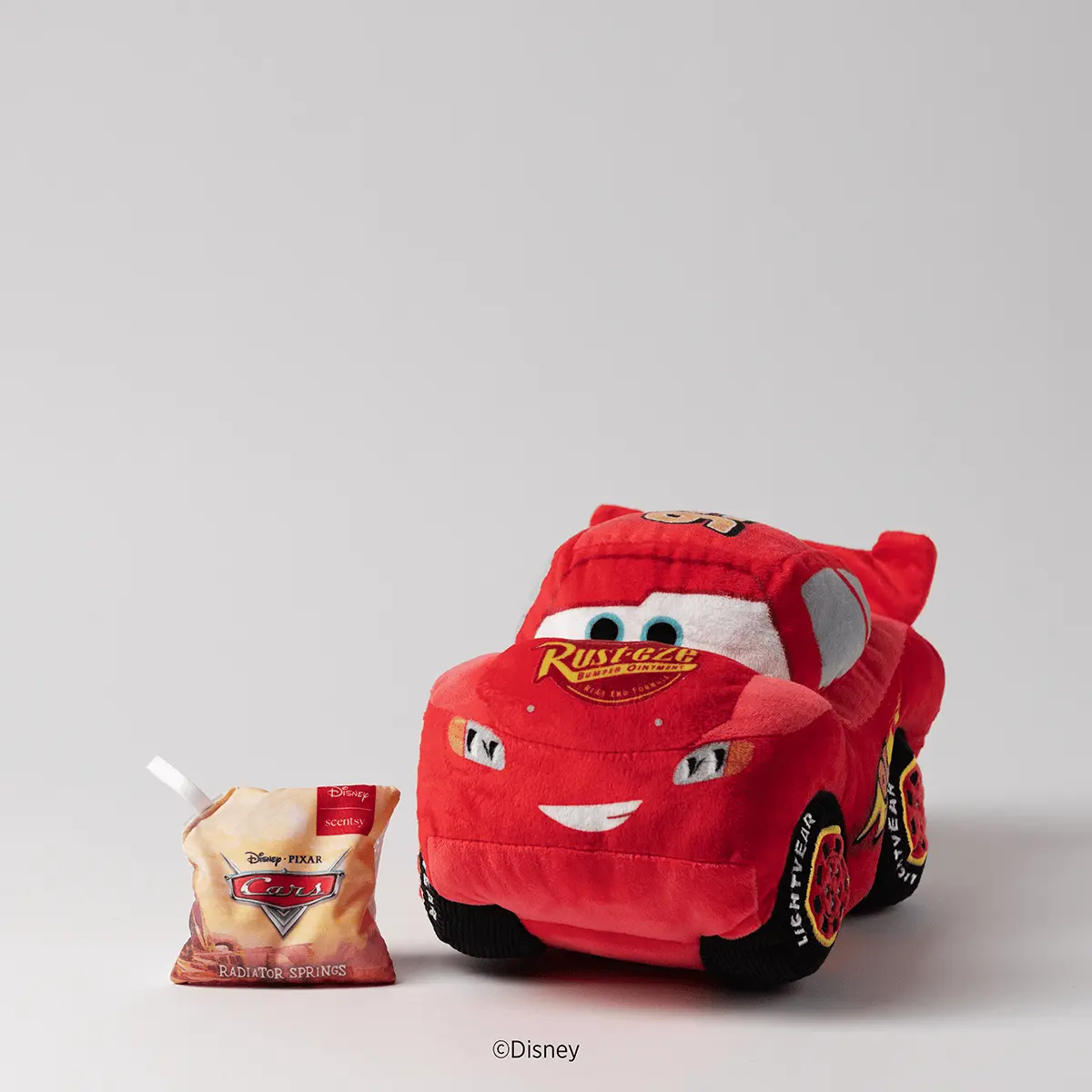 Plushbuddylightningmcqueenpackshotmainra2026Pws_Highres Disney and Pixar’s Lightning McQueen Scentsy Buddy