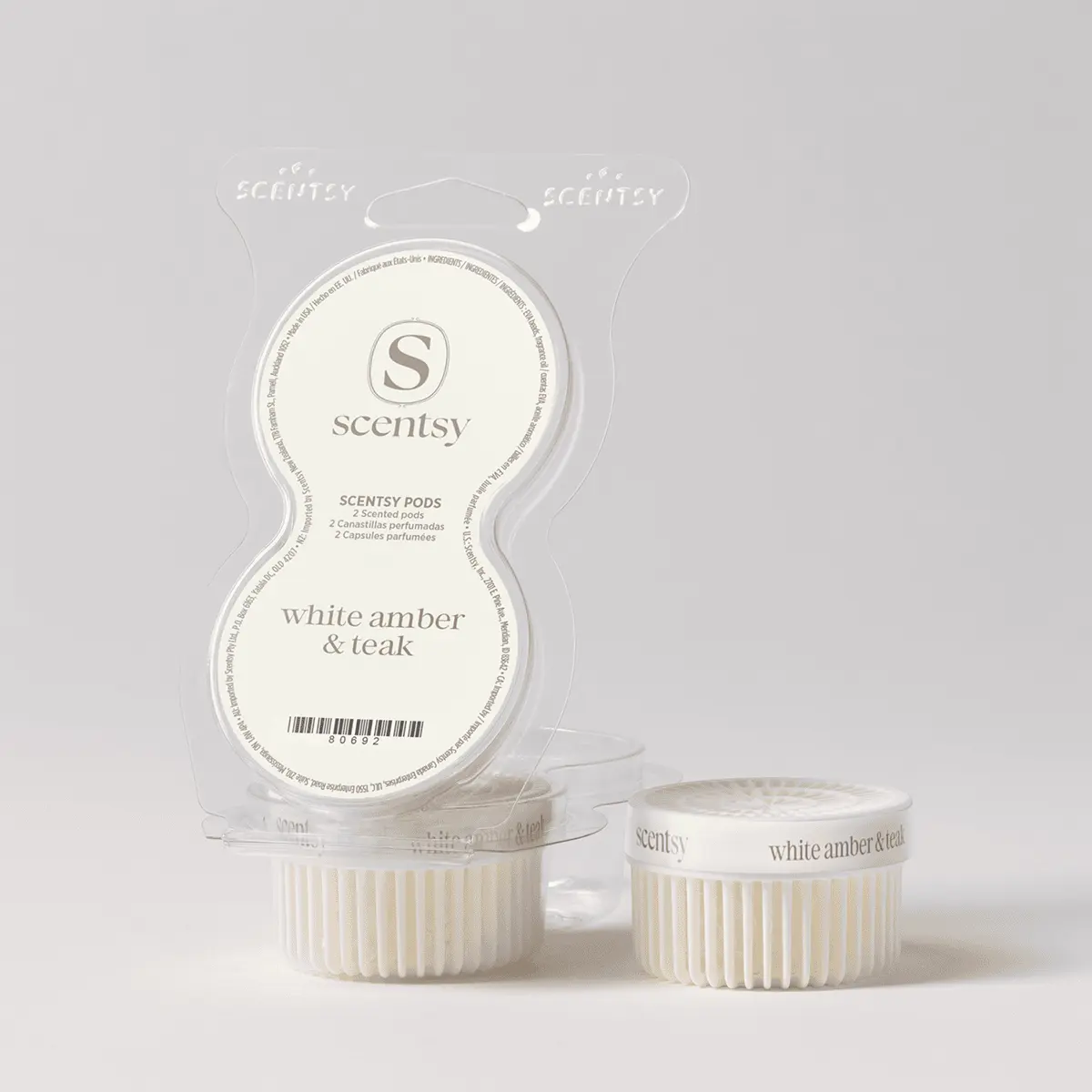 Scentpodswhiteamberteakpackshotclamshellr12026Pws_Highres White Amber & Teak Scentsy Pods